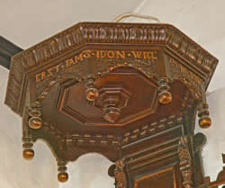 Oak pulpit canopy with inscriptions